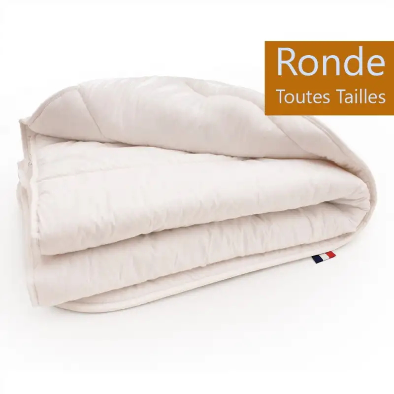 couette-ronde-adaptee-au-lit-rond-1